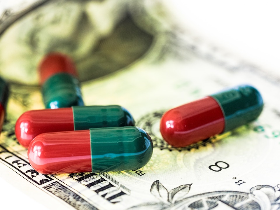 health supplements on dollar bill